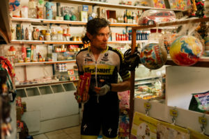 Weisbauer sponsored cyclist Christoph Strasser blearily wanders around a Greek cornershop looking to resupply with food and water on TCR09